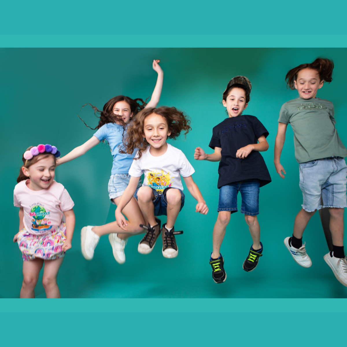 Five children jumping in mid-air on a teal background, wearing colourful clothing and smiling. Each child expresses joy and energy, showcasing a fun and inclusive vibe